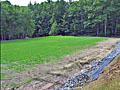 Leveled, grassy site for tent