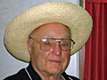 Andrew Simoni in a straw hat