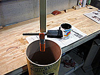 Paintbrush on a stick
